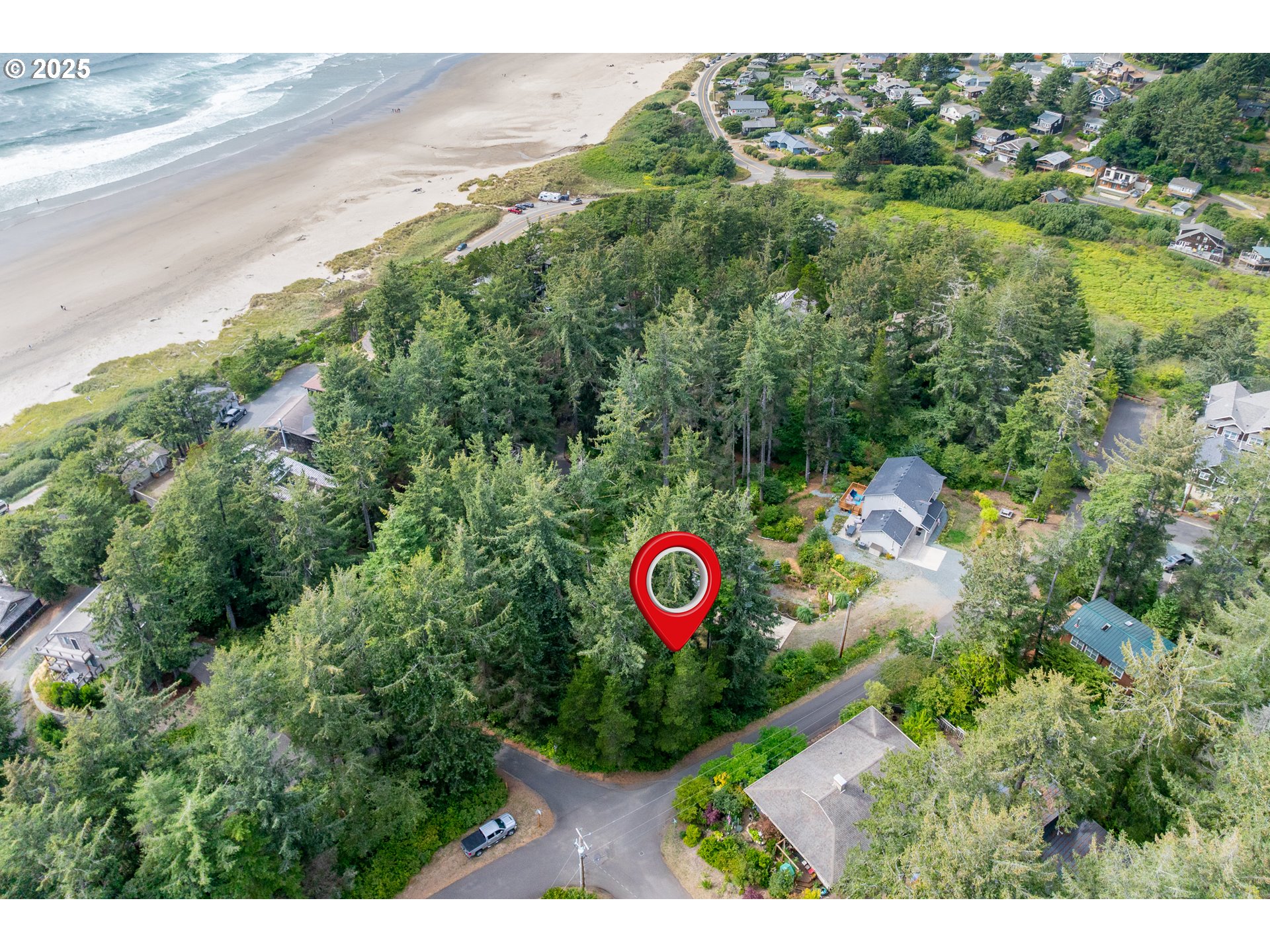 1503 Cherry Street Manzanita, OR 97130 - Photo 2 of 18 a view of a street with a yard and mountain view