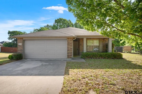 front view of house with a yard