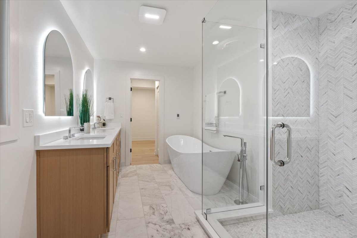 1975 Sunset Ridge Road Northfield, IL 60093 - Photo 28 of 53 a bathroom with a double vanity sink mirror and toilet