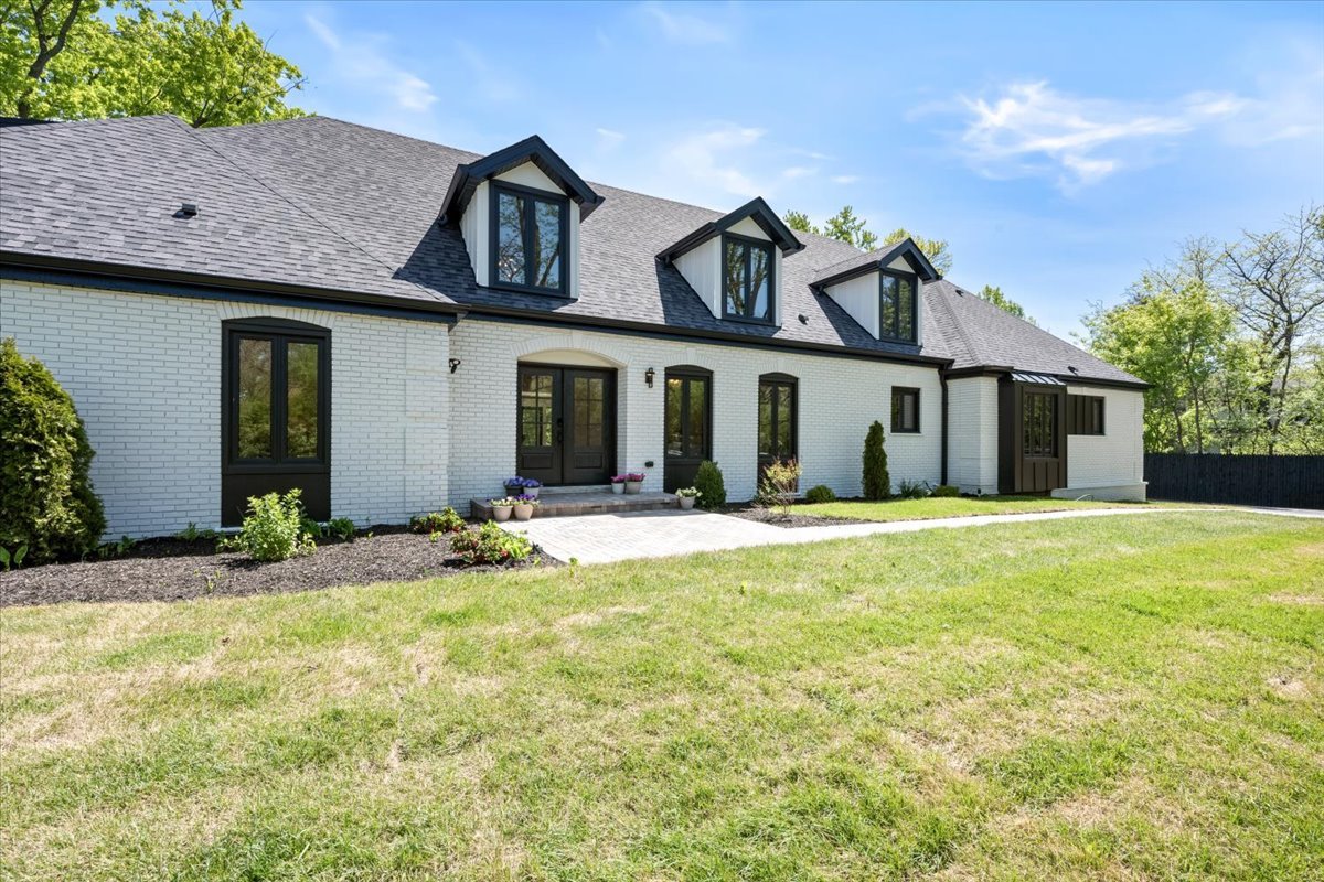 1975 Sunset Ridge Road Northfield, IL 60093 - Photo 3 of 53 front view of a house with a yard