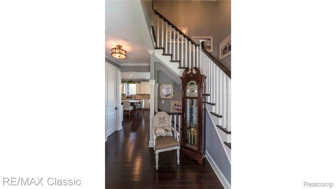 Foyer w/Hardwood Floors & Wood Staircase