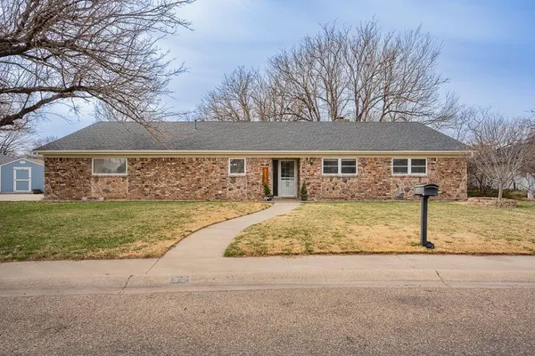 a view of house with outdoor space