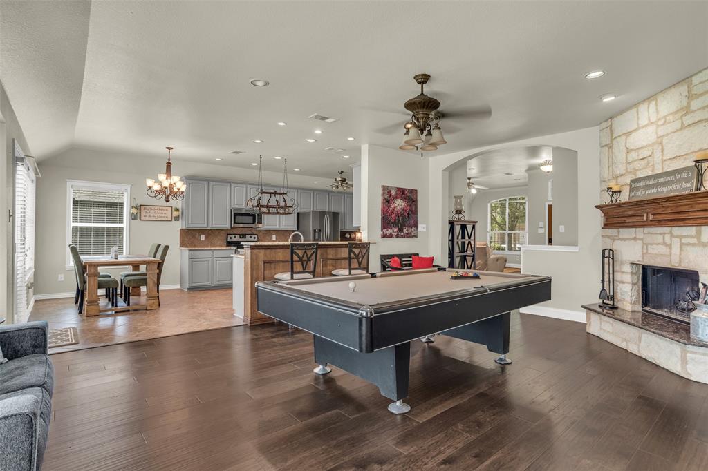 2309 Ranch House Drive Denton, TX 76210 - Photo 11 of 28 a living room with furniture and kitchen view