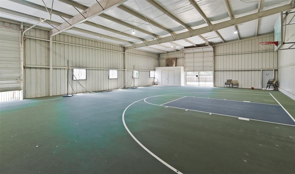 2309 Ranch House Drive Denton, TX 76210 - Photo 24 of 28 a room with a lot of windows