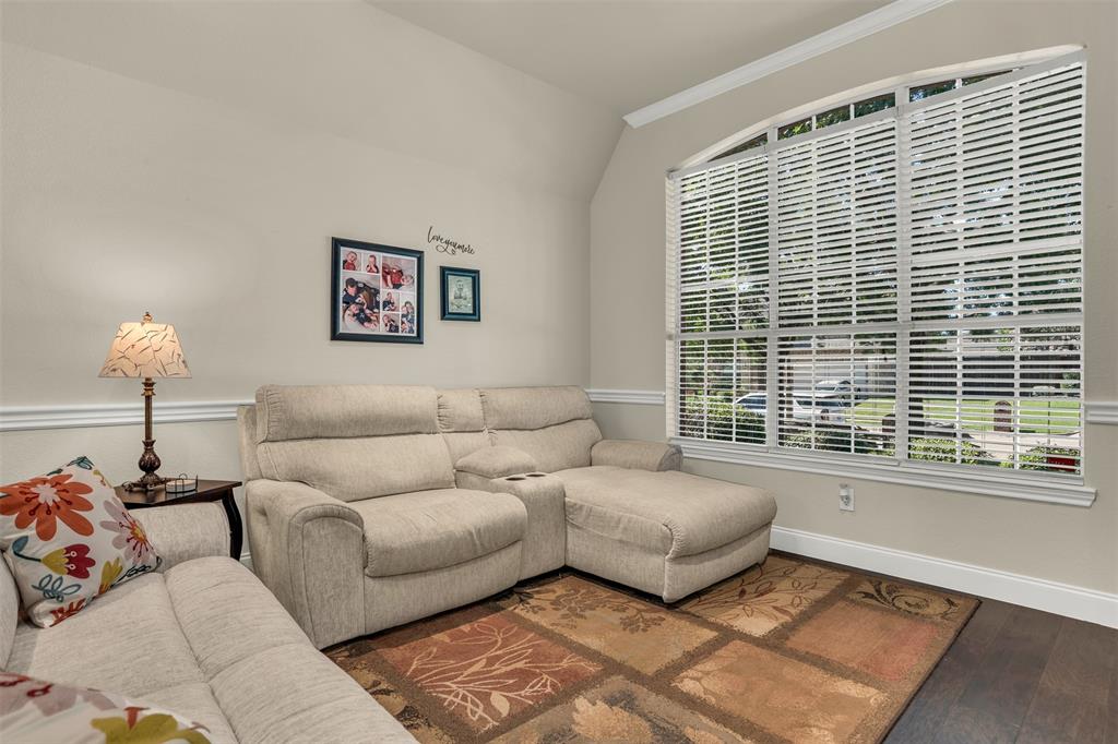 2309 Ranch House Drive Denton, TX 76210 - Photo 4 of 28 a living room with furniture and a window