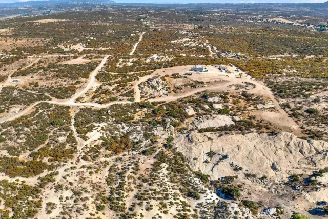an aerial view of residential houses with ocean view