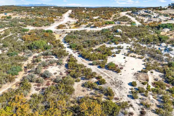 a view of city and green space
