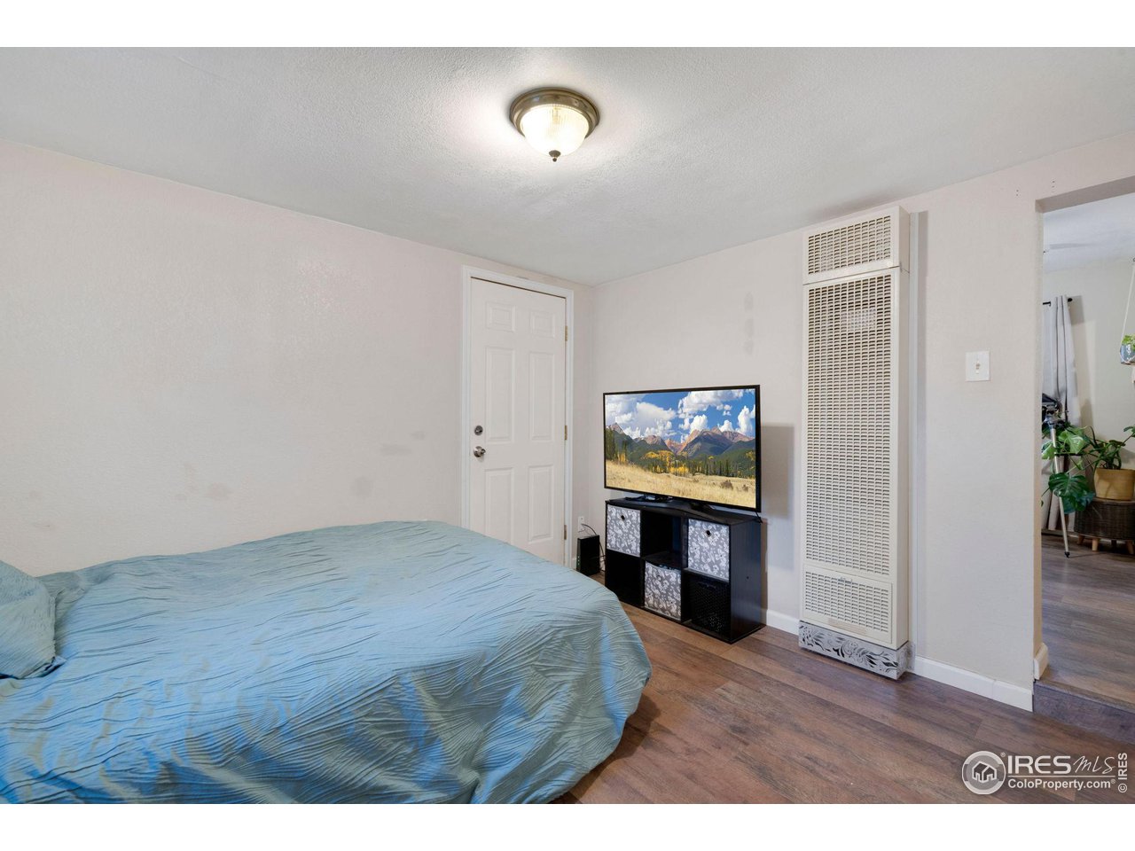 109 3rd Street Pierce, CO 80650 - Photo 12 of 21 a living room with furniture and a flat screen tv