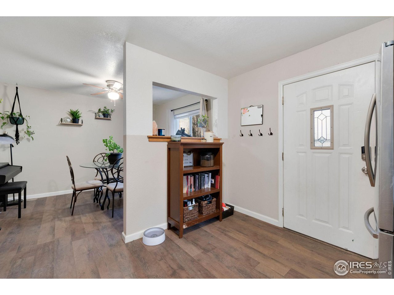 109 3rd Street Pierce, CO 80650 - Photo 5 of 21 a living room with furniture and wooden floor