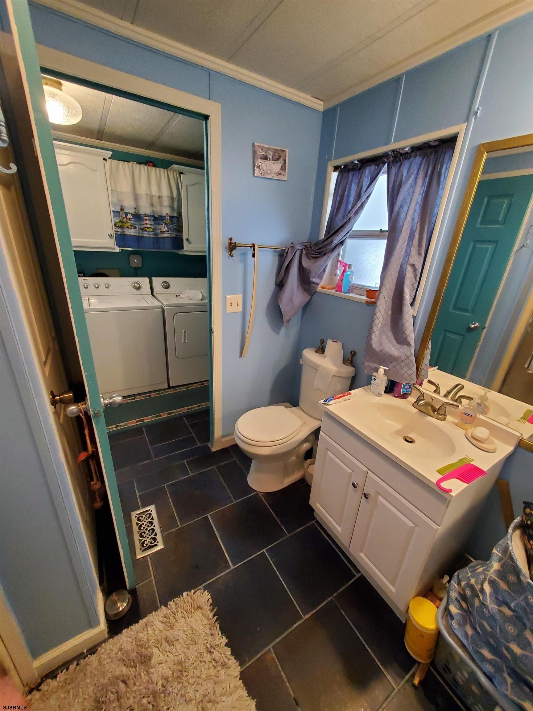 334 John Alden Drive Buena, NJ 08310 - Photo 13 of 27 a bathroom with a sink toilet and shower