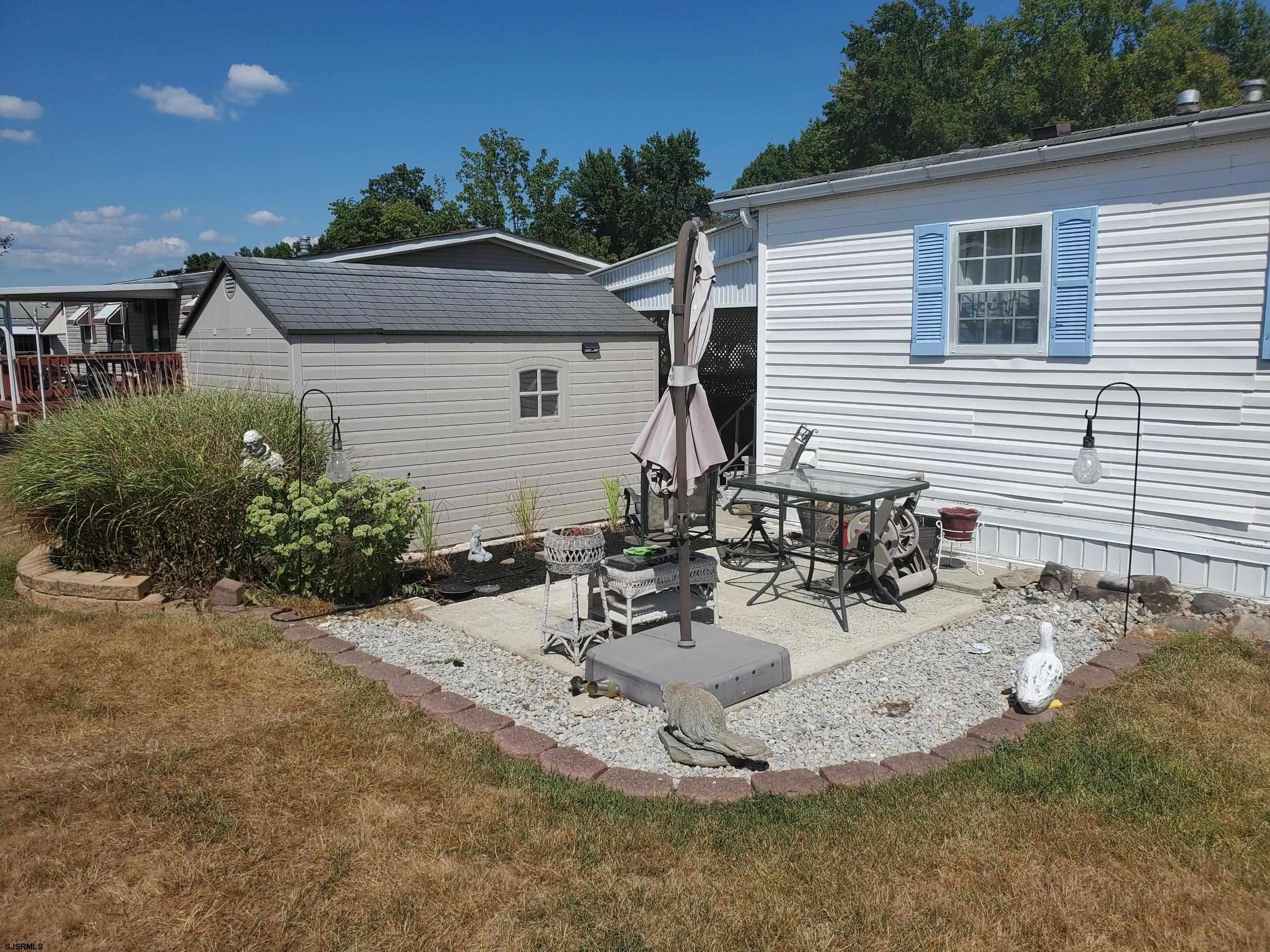 334 John Alden Drive Buena, NJ 08310 - Photo 26 of 27 a view of a house with a patio
