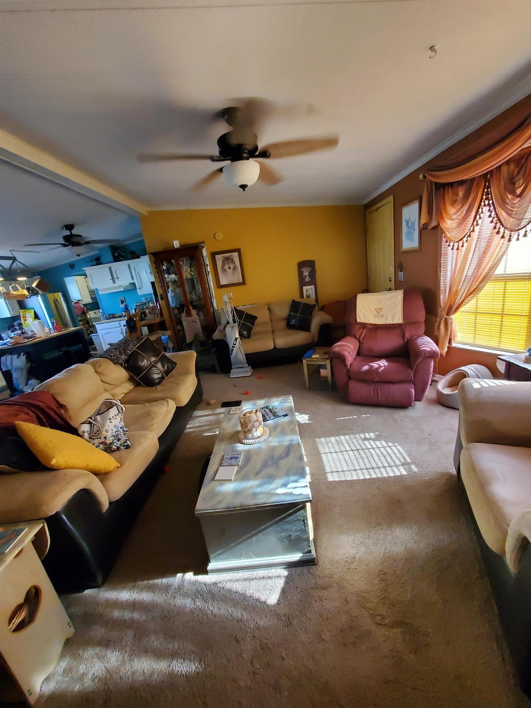 334 John Alden Drive Buena, NJ 08310 - Photo 4 of 27 a living room with furniture and a large window