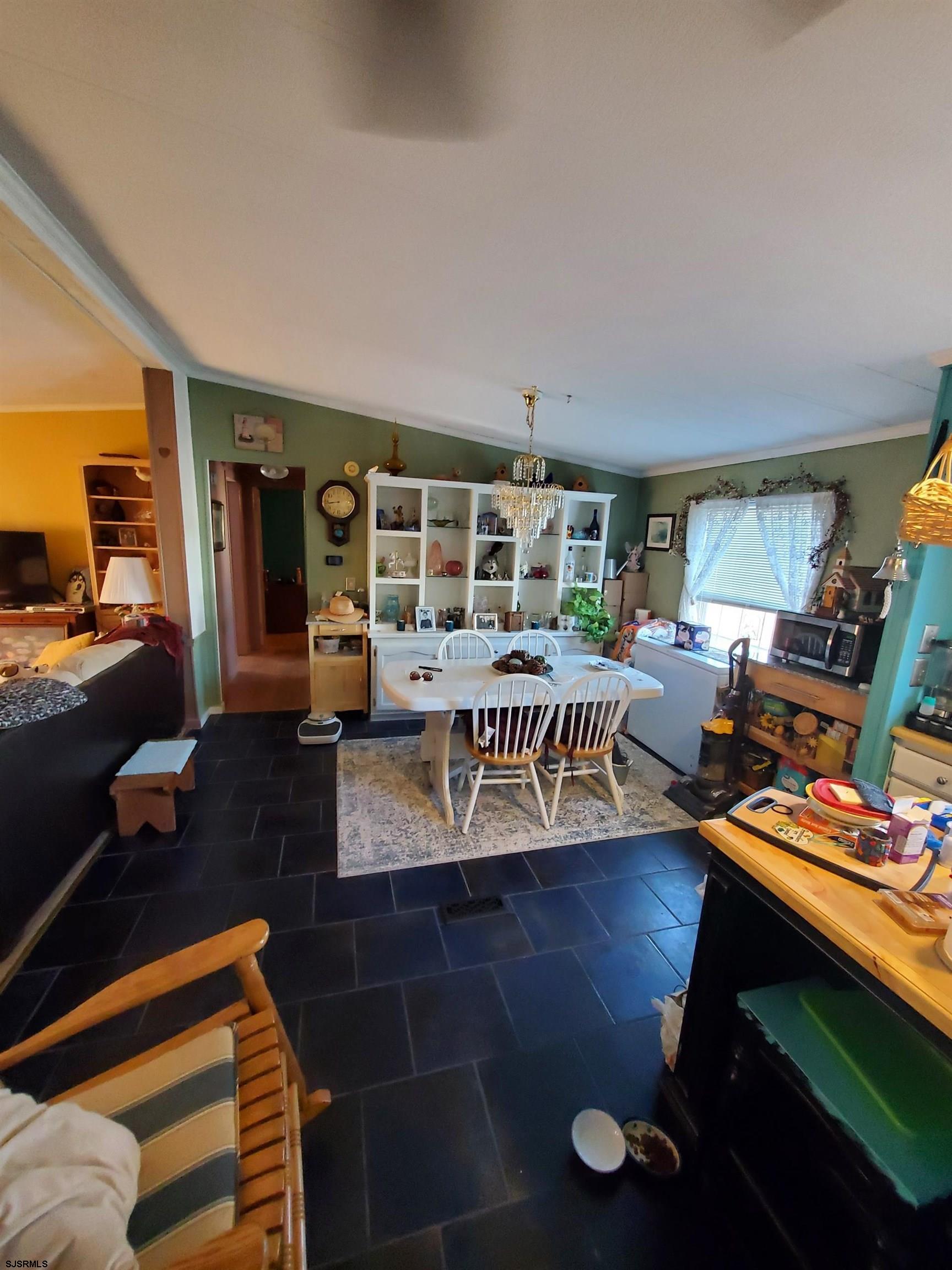 334 John Alden Drive Buena, NJ 08310 - Photo 7 of 27 a living room with furniture and a flat screen tv