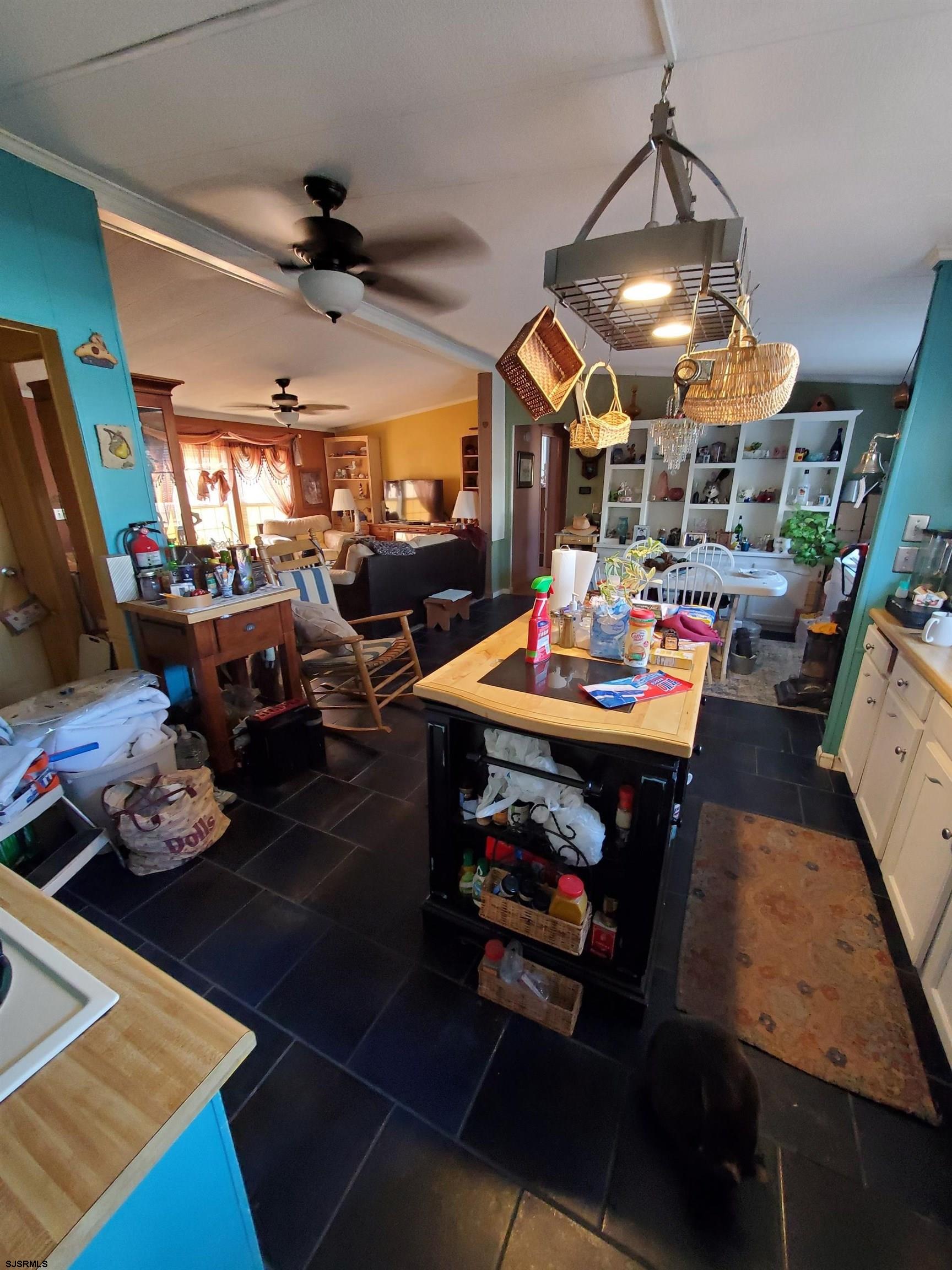 334 John Alden Drive Buena, NJ 08310 - Photo 8 of 27 a living room with lots of furniture and kitchen view