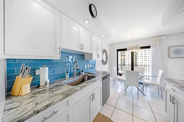 a kitchen with counter space cabinets and appliances
