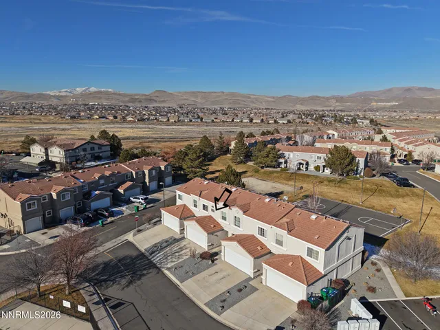 an aerial view of a city with lots of residential buildings