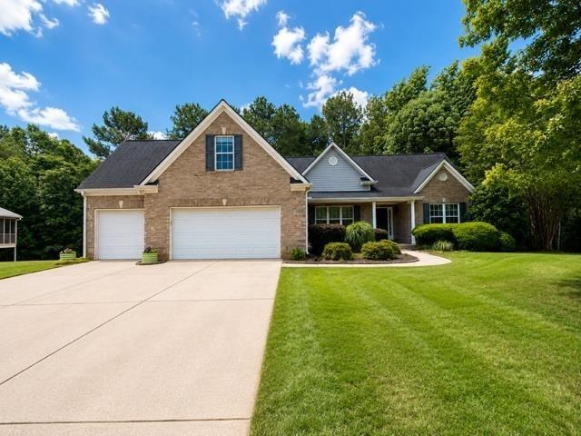 1218 Morgans Run Monroe, GA 30656 - Photo 1 of 39 a front view of house with yard and green space