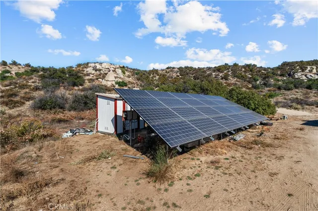 a view of a wooden roof with a yard in back