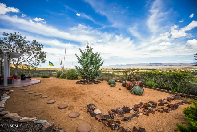 a view of backyard of a house