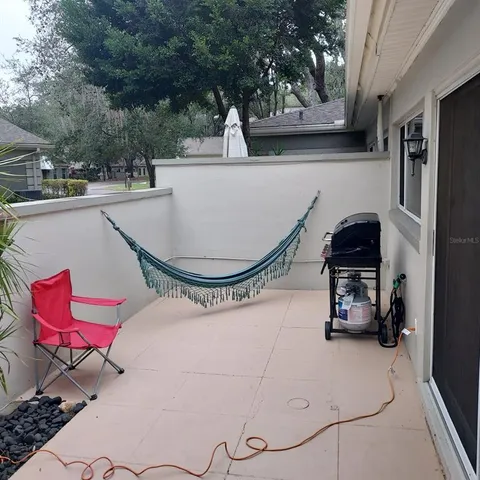 a bedroom with a flower bed and a potted plant