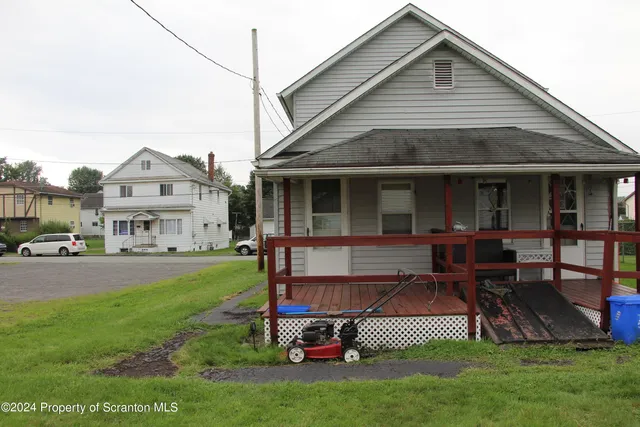 a view of a park with a large window