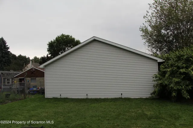 a view of a house with a garden