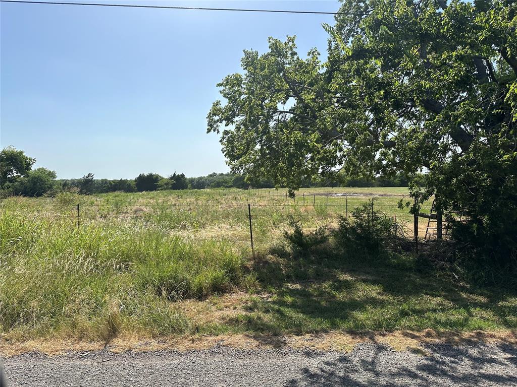 Lot 9 Webb Smith Road Sherman, TX 75090 - Photo 13 of 24 a view of lake with green field