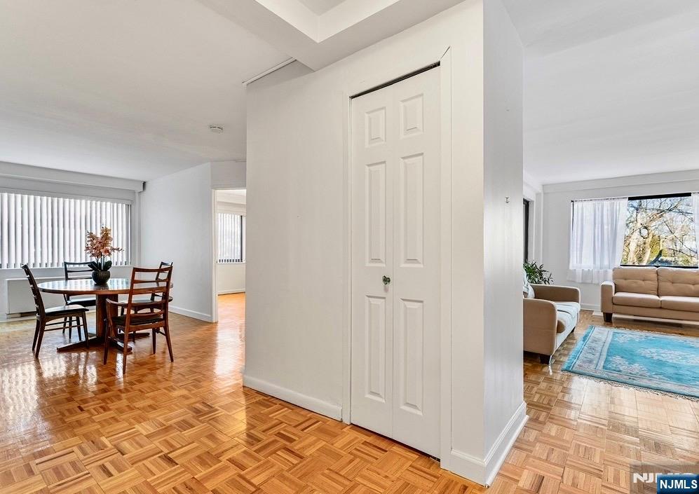 1375 River Road, Unit 1K Edgewater, NJ 07020 - Photo 4 of 15 a view of a dining room with furniture