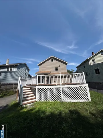 a view of a big room with a balcony
