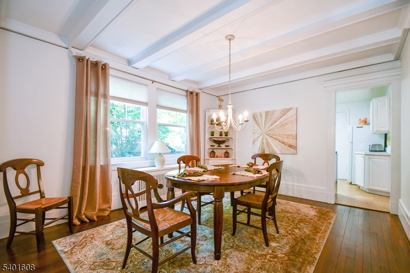 123 Baker Street Maplewood, NJ 07040 - Photo 5 of 10 a dining room with furniture window wooden floor