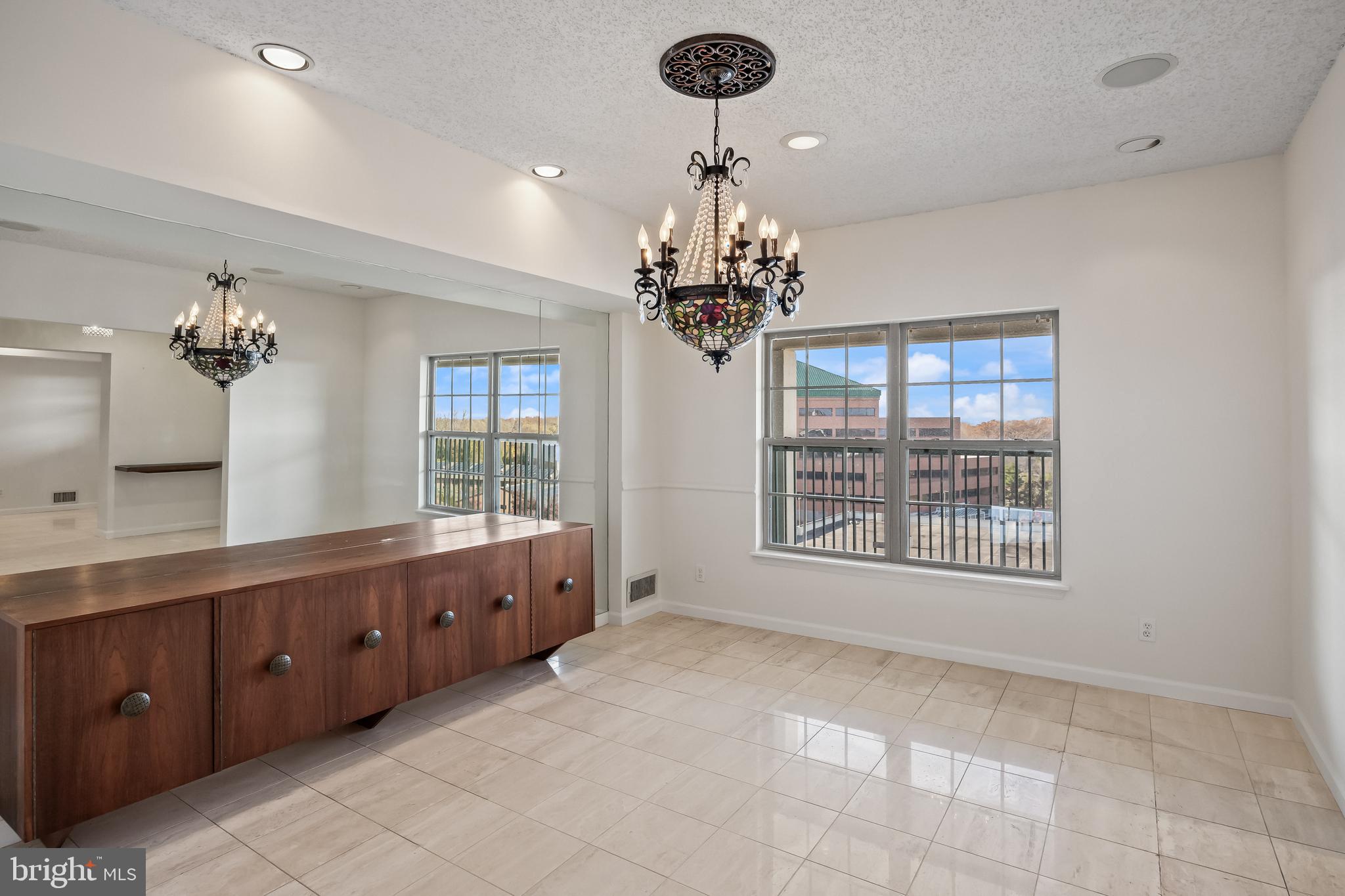 6072 Main Street Voorhees, NJ 08043 - Photo 18 of 41 a large room with windows and chandelier