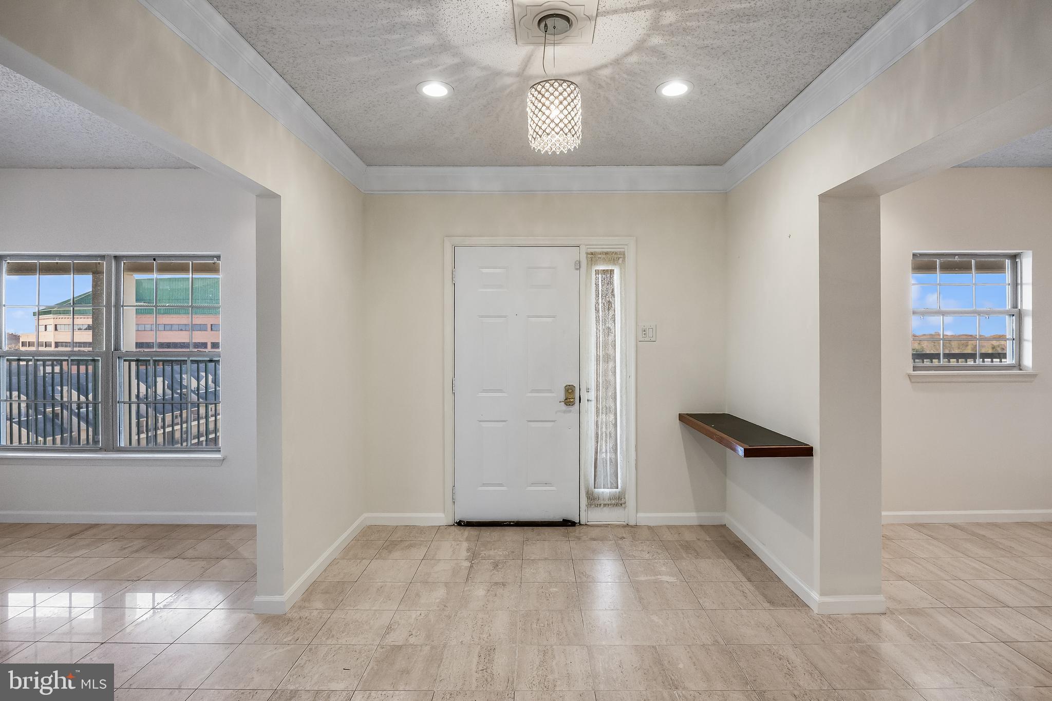 6072 Main Street Voorhees, NJ 08043 - Photo 21 of 41 an empty room with wooden floor and windows