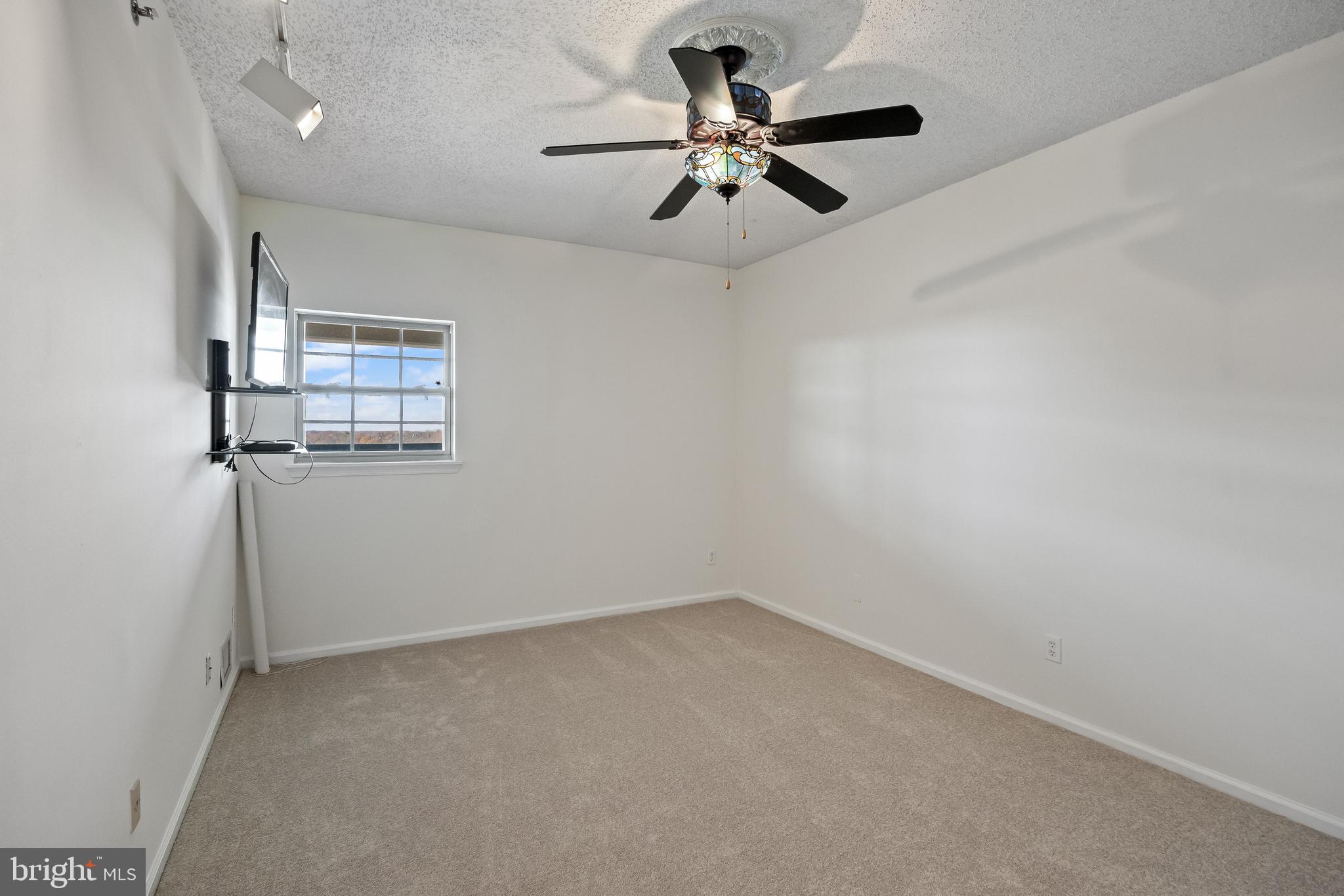 6072 Main Street Voorhees, NJ 08043 - Photo 8 of 41 a view of a big room with carpet