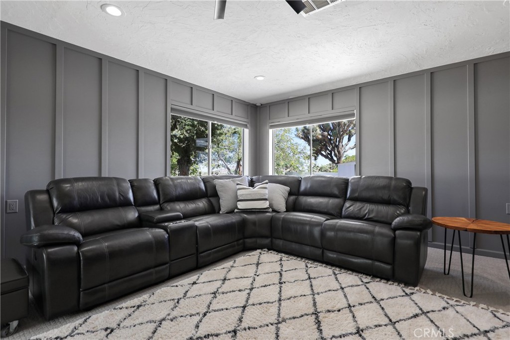 56800 Java Drive Yucca Valley, CA 92284 - Photo 12 of 43 a living room with furniture and a window