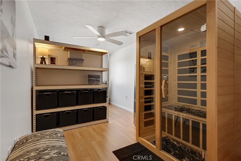 56800 Java Drive Yucca Valley, CA 92284 - Photo 16 of 43 a view of walk in closet with empty racks