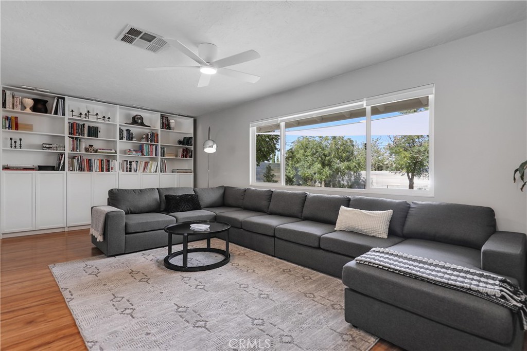 56800 Java Drive Yucca Valley, CA 92284 - Photo 5 of 43 a living room with furniture a rug and a large window