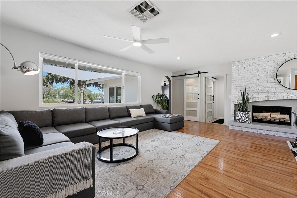 56800 Java Drive Yucca Valley, CA 92284 - Photo 6 of 43 a living room with furniture and a fireplace