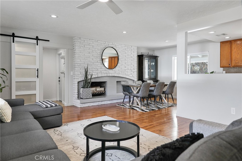 56800 Java Drive Yucca Valley, CA 92284 - Photo 7 of 43 a living room with furniture a rug and a large window