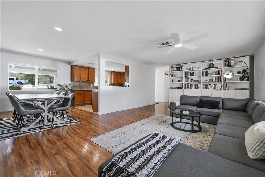 56800 Java Drive Yucca Valley, CA 92284 - Photo 8 of 43 a living room with furniture and a wooden floor