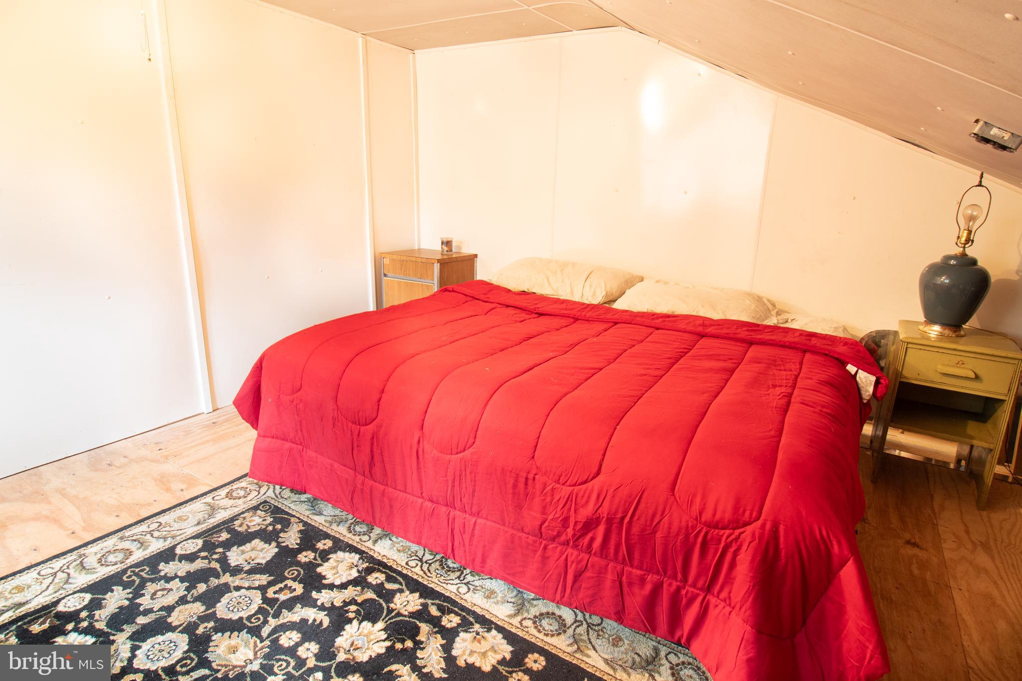0 Means Hollow Road Shippensburg, PA 17257 - Photo 11 of 52 a bed sitting in a bedroom next to a window