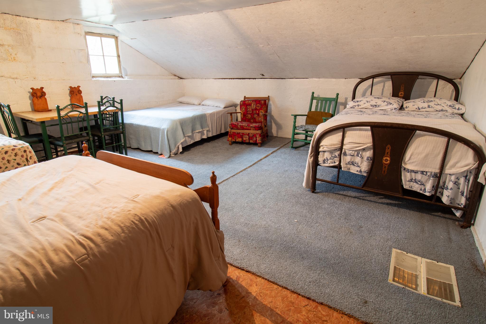 0 Means Hollow Road Shippensburg, PA 17257 - Photo 14 of 52 a bed sitting in a room next to a window