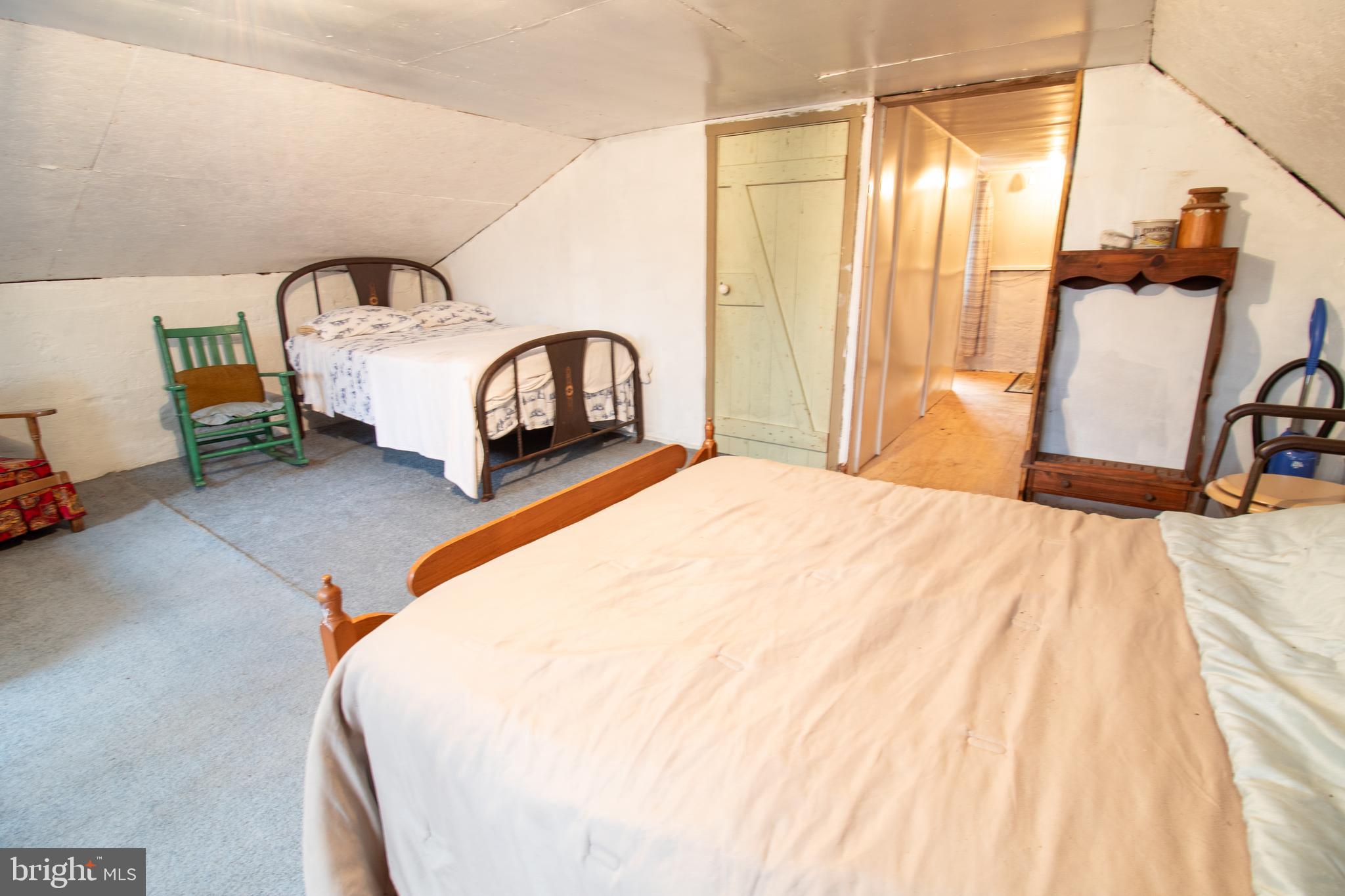 0 Means Hollow Road Shippensburg, PA 17257 - Photo 16 of 52 a bedroom with a bed and a dresser with mirror