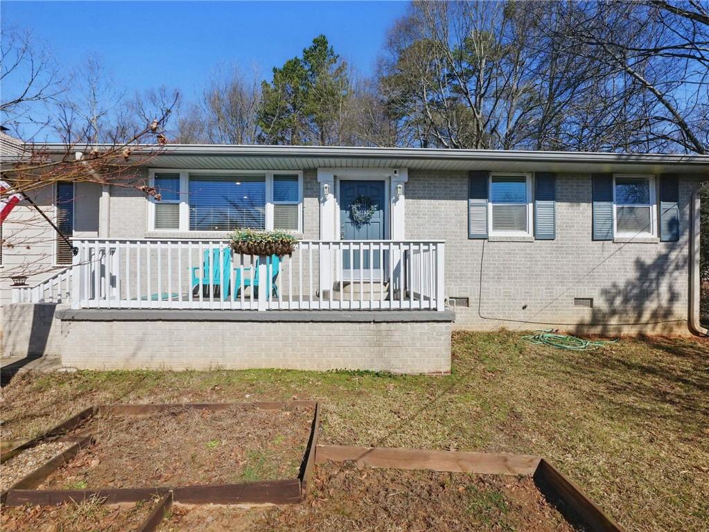 2093 Beverly Road Gainesville, GA 30501 - Photo 1 of 24 a view of house with outdoor space
