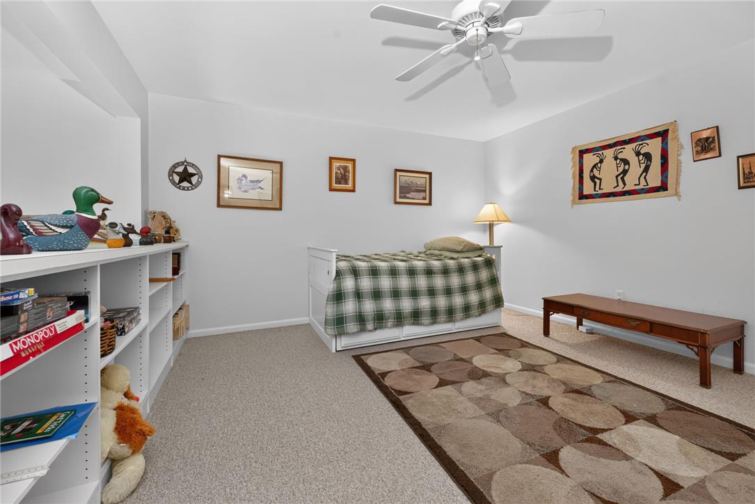 198 Park Ridge Drive Easton, PA 18040 - Photo 18 of 28 A comfortable bedroom features plush carpeting and a convenient ceiling fan for optimal airflow.