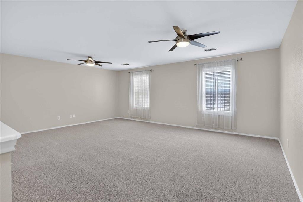 1627 Kawati Way Krum, TX 76249 - Photo 25 of 32 a view of an empty room with a window