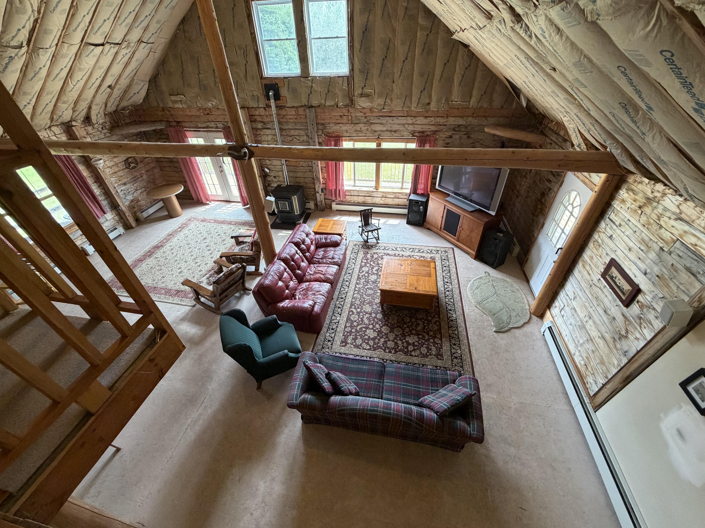 8 Steward Road Monson, ME 04464 - Photo 11 of 22 Looking down to living room from loft