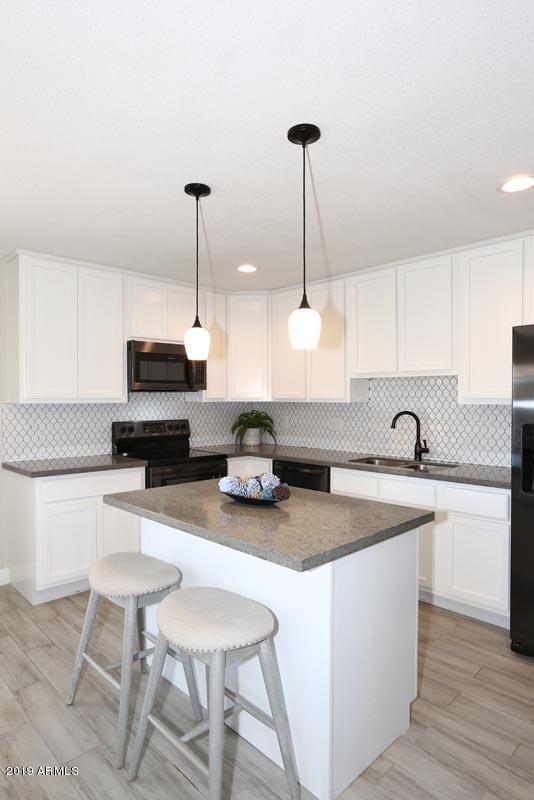 8531 East Chaparral Road Scottsdale, AZ 85250 - Photo 12 of 39 Kitchen-Island Bar