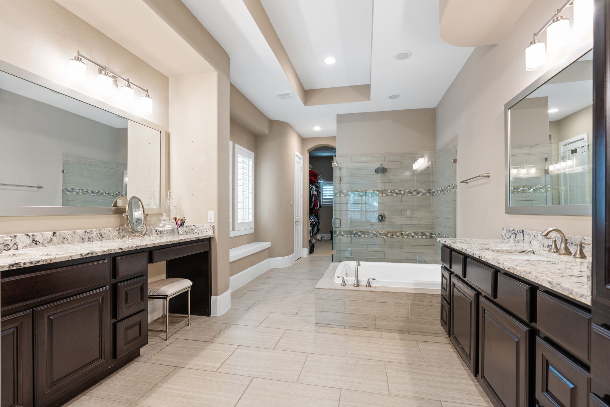 2914 Rutherford Pl Court Katy, TX 77494 - Photo 28 of 50 a large bathroom with a double vanity sink a large mirror and a shower