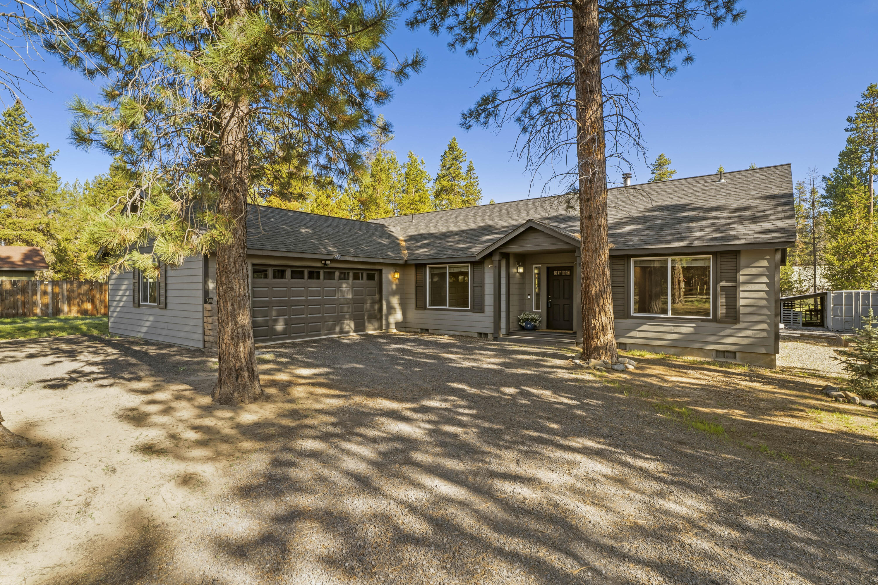 16050 Dick Road La Pine, OR 97739 - Photo 59 of 59 a front view of a house with a tree in it