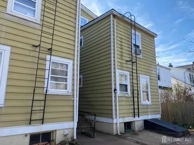 a front view of a house with a garage